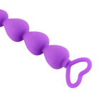 Mărgele anale HeavyFun din silicon violet cu inimă 17 cm