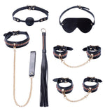 Set de bondage Bad Kitty cu 6 piese, negru cu accente aurii