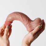 Dildo realist Crushious Inviktus din silicon lichid 22 cm culoarea pielii