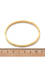 Brățară rigidă cu zirconii transparente, placată cu aur 18K
