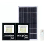 Set 2 proiectoare LED SMD 30W cu incarcare solara Flippy, panou solar, cu telecomanda, suport prindere, material ABS,