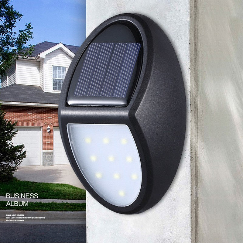Aplica solara LED pentru perete Flippy, in forma ovala, 10 LED-uri, lumina puternica, IP65, 12 x 7.5 cm, 1.2 V, 300