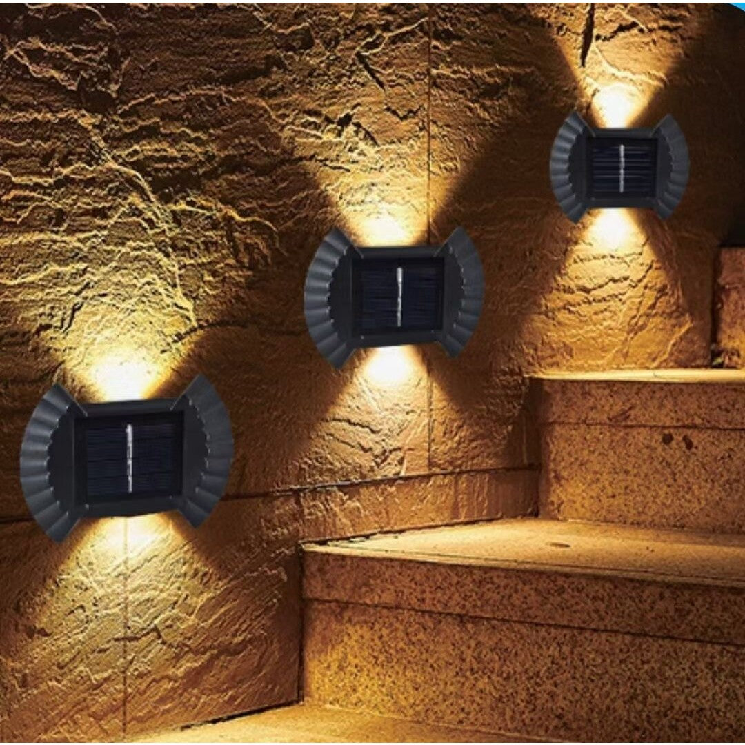 Set 4 Aplice solare LED Bidirectionale pentru perete Flippy, in forma de funda, 8 LED-uri, material ABS si PC, lumina