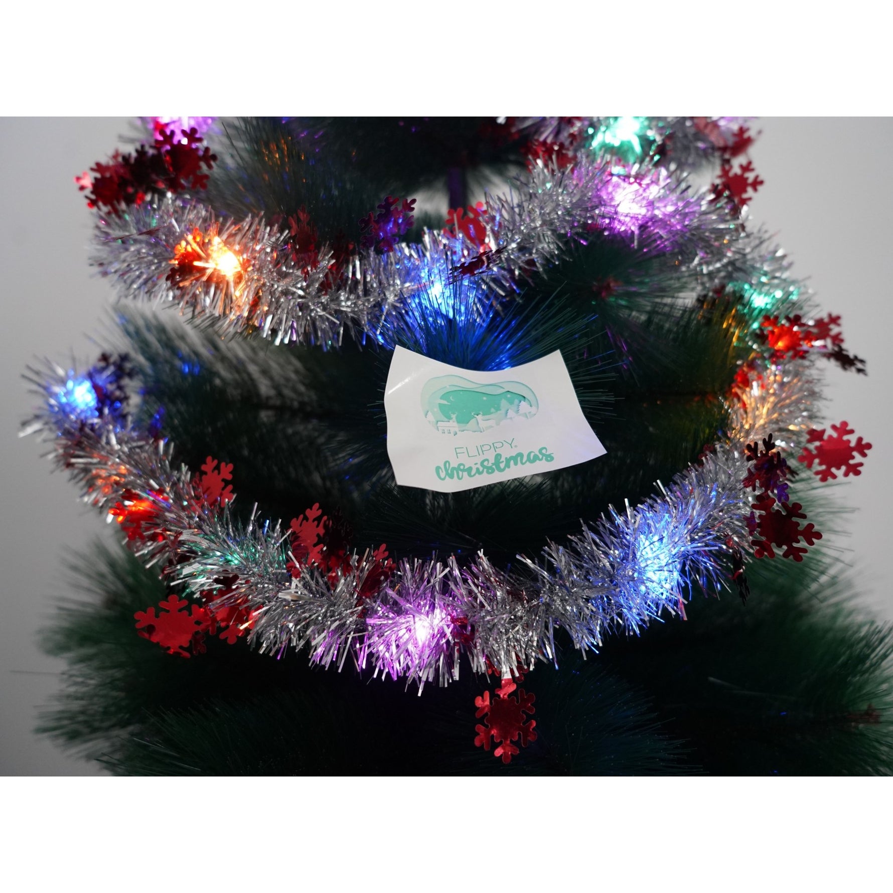 Beteala Craciun cu LED, Rosie, model cu fulgi de nea, 2 m x 5 cm, PVC, Sir, Artificiala, Flippy