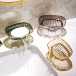 Savoniera cu Suport, Flippy, Sistem de Scurgere a Apei, Margine Aurie, 14 x 8.5 x 9 cm, din TPE, Transparent