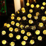 Instalatie Craciun, Tip Globuri de cristal, 50 Led-uri, 9.5 metri, Alb cald, Energie solara, Senzor de lumina, Flippy