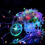 Instalatie de Craciun, Liniara, 1 m, Baterii, 10 LED-uri, Multicolor, 2 Jocuri de Lumini, Fir Transparent,