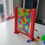 Joc de inteligenta Tetris puzzle tangram Flippy, 70 de piese multicolore, 3D, montessori, interactiv, din plastic, zar