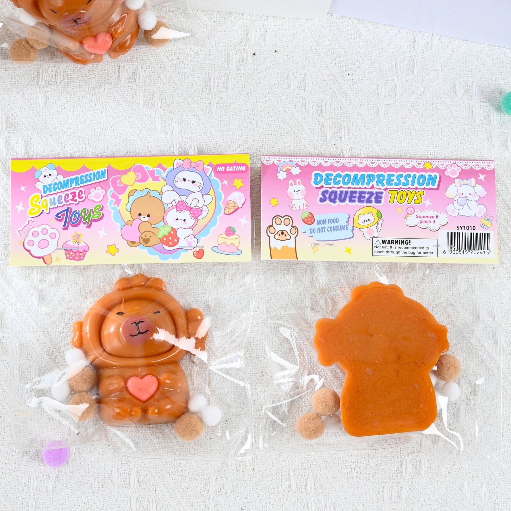 Jucarie Antistres Squishy, Flippy, cu Revenire Lenta, Model Capybara cu Inima, 7.5cmx6.5 cm, din TPR, Ambalaj