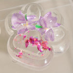 Jucarie Antistres Squishy, Flippy, Labuta de Pisica Pufoasa, cu Revenire Lenta, 7 x 6.5 cm, Model Flori 2, Transparent