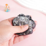 Jucarie Antistres Squishy, Flippy, cu Revenire Lenta, Squeeze Pinch Family, Model Labuta de Pisica cu Sclipici, 6.5x6
