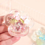 Jucarie Antistres Squishy, Flippy, Labuta de Pisica Pufoasa, cu Revenire Lenta, 7 x 6.5 cm, Model Flori 1, Transparent