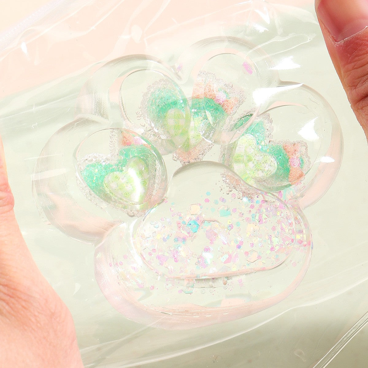 Jucarie Antistres Squishy, Flippy, Labuta de Pisica Pufoasa, cu Revenire Lenta, 7 x 6.5 cm, Model Inima, Multicolor