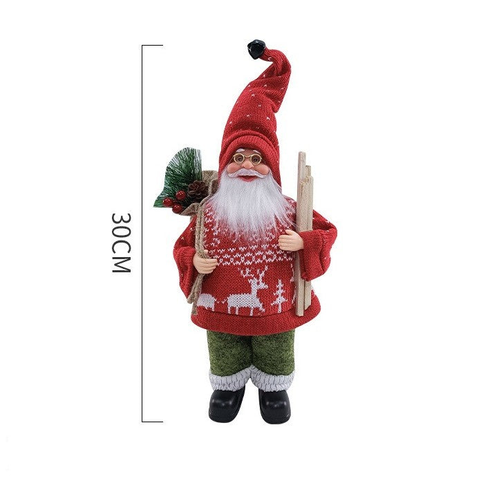 Figurina Decorativa Craciun, Flippy, Mos Craciun cu Lemne la Brat, 30 x 17 x 10 cm, Material Plastic+Textil,