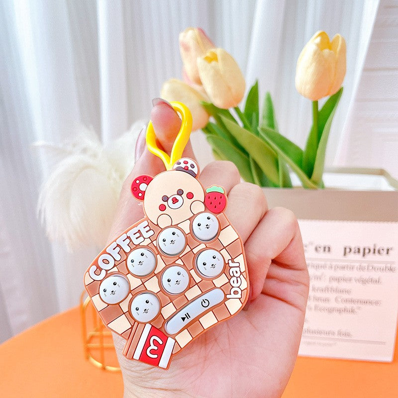 Jucarie pentru copii portabila Flippy, joc Gopher, cu lumini si muzica, tip breloc, model ursulet, material silicon si