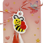 Martisor pentru Copii, Jolie, Model ALBINUTA, din Cauciuc, cu Snur Impletit Alb/Rosu, Ambalaj Carton cu Design, Galben