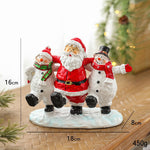 Ornament Decoratiune de Craciun, Flippy, Decoratiune Mica pentru Craciun din Rasina, Model Mos Craciun cu Oameni de