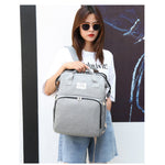 Rucsac Multifunctional pentru Mamici, Flippy, cu Patut Pliabil si Baza de Schimbat, Rezistent la Apa, Capacitate Mare,