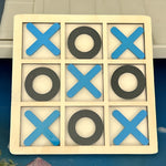 Jucarie Montessori Tic Tac Toe, Flippy, Educativa, Interactiva, din lemn, X si O, 9 Piese, 14.3x14.3 cm, Albastru Negru