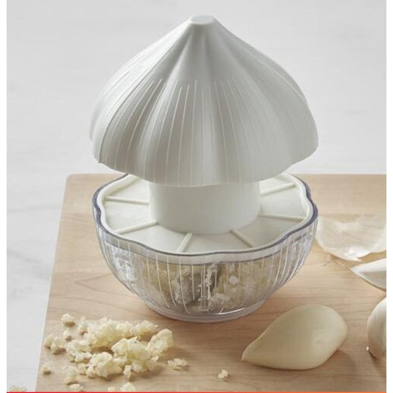Tocator manual pentru usturoi, in forma de usturoi, cutite rezistente, utilizare prin apasare, material ABS si inox,