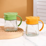 Recipient Condimente, Flippy, din Stilca, 180 ml, cu Maner si Lingurita, 11.3 x 8.2 cm, Capac Ondulat, Verde